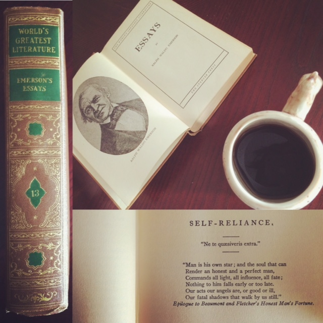 The book "Emerson's Essays" open to the title page next to a cup of coffee.